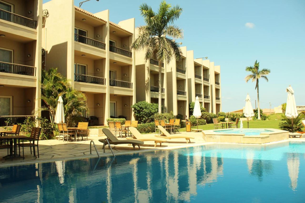 Panacea Suites Hotel Borg El Arab Extérieur photo