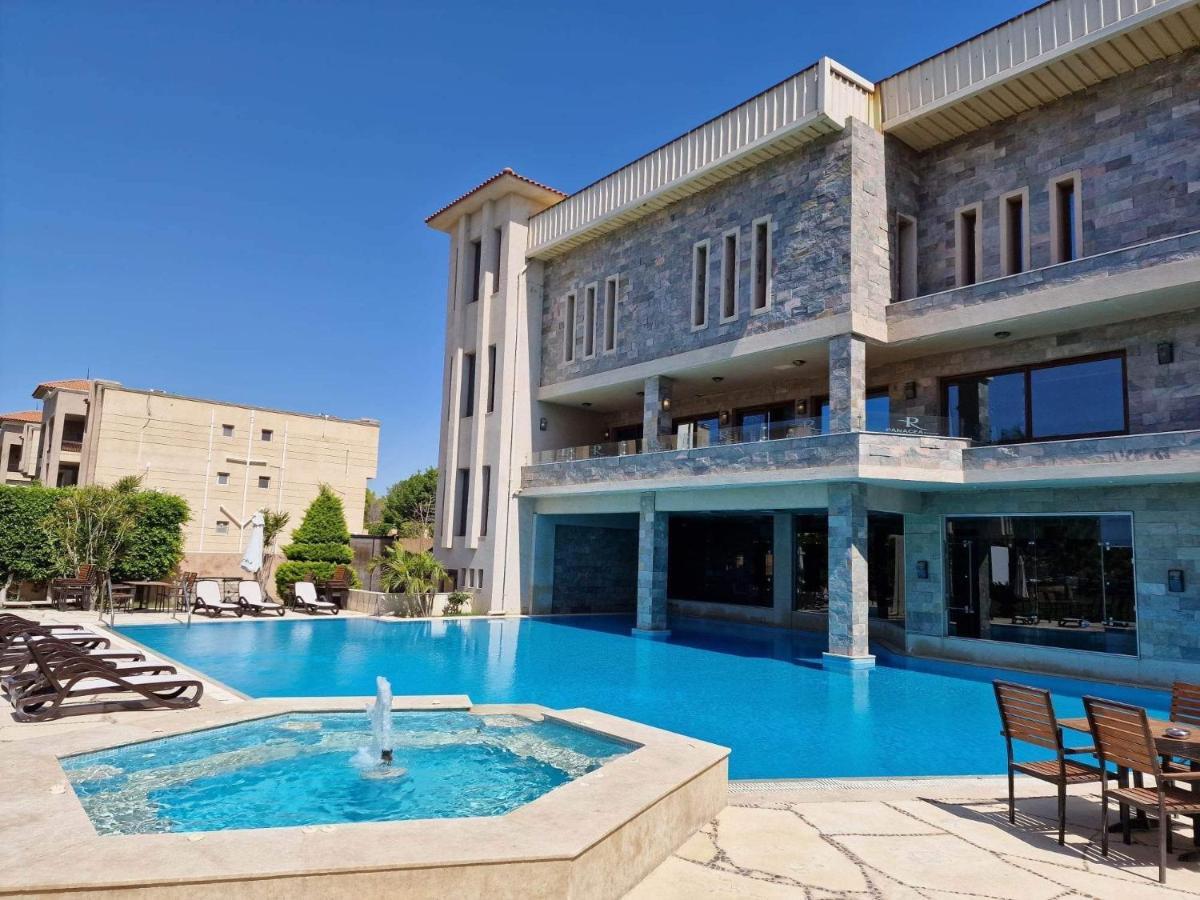 Panacea Suites Hotel Borg El Arab Extérieur photo