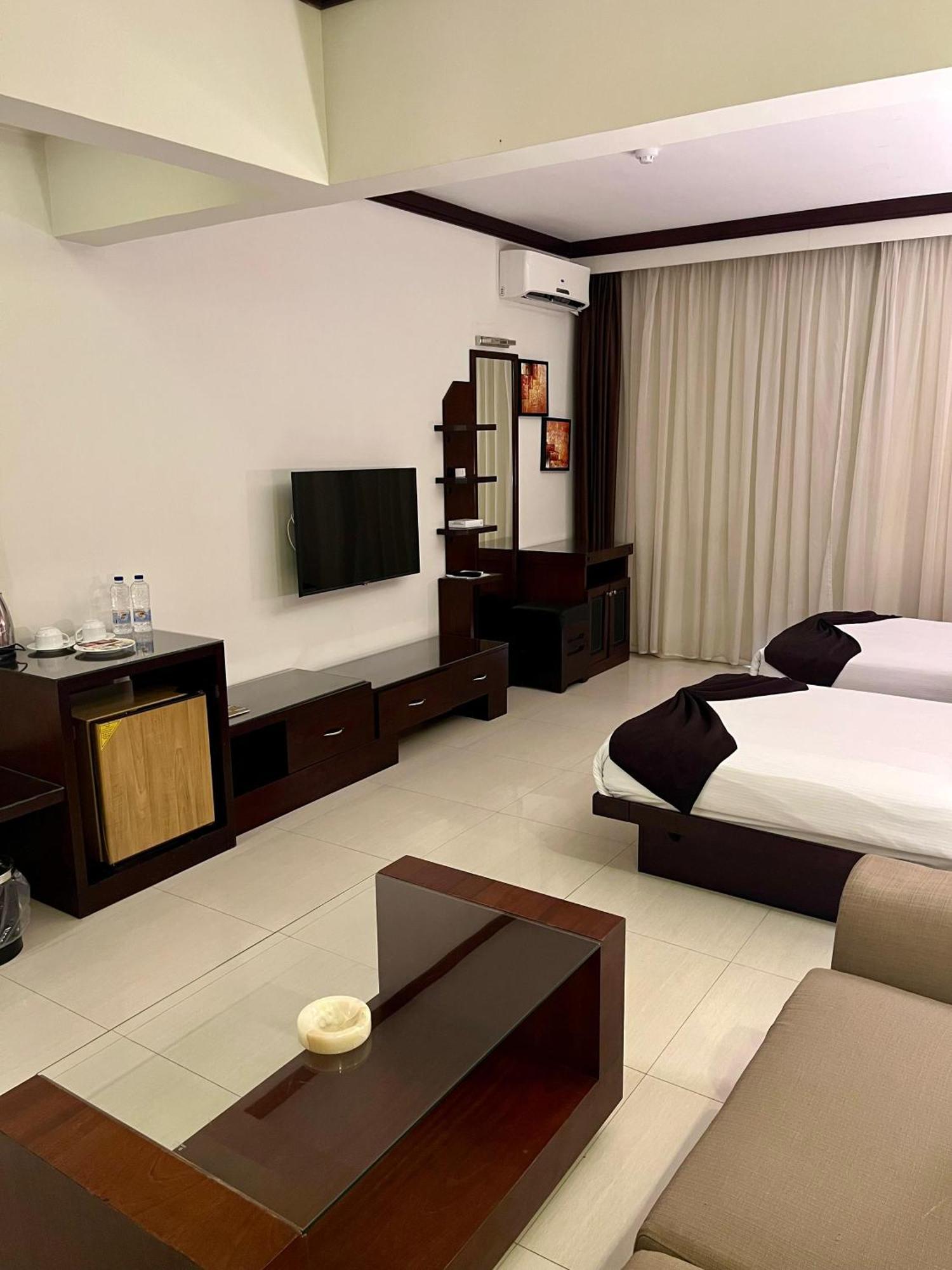 Panacea Suites Hotel Borg El Arab Extérieur photo