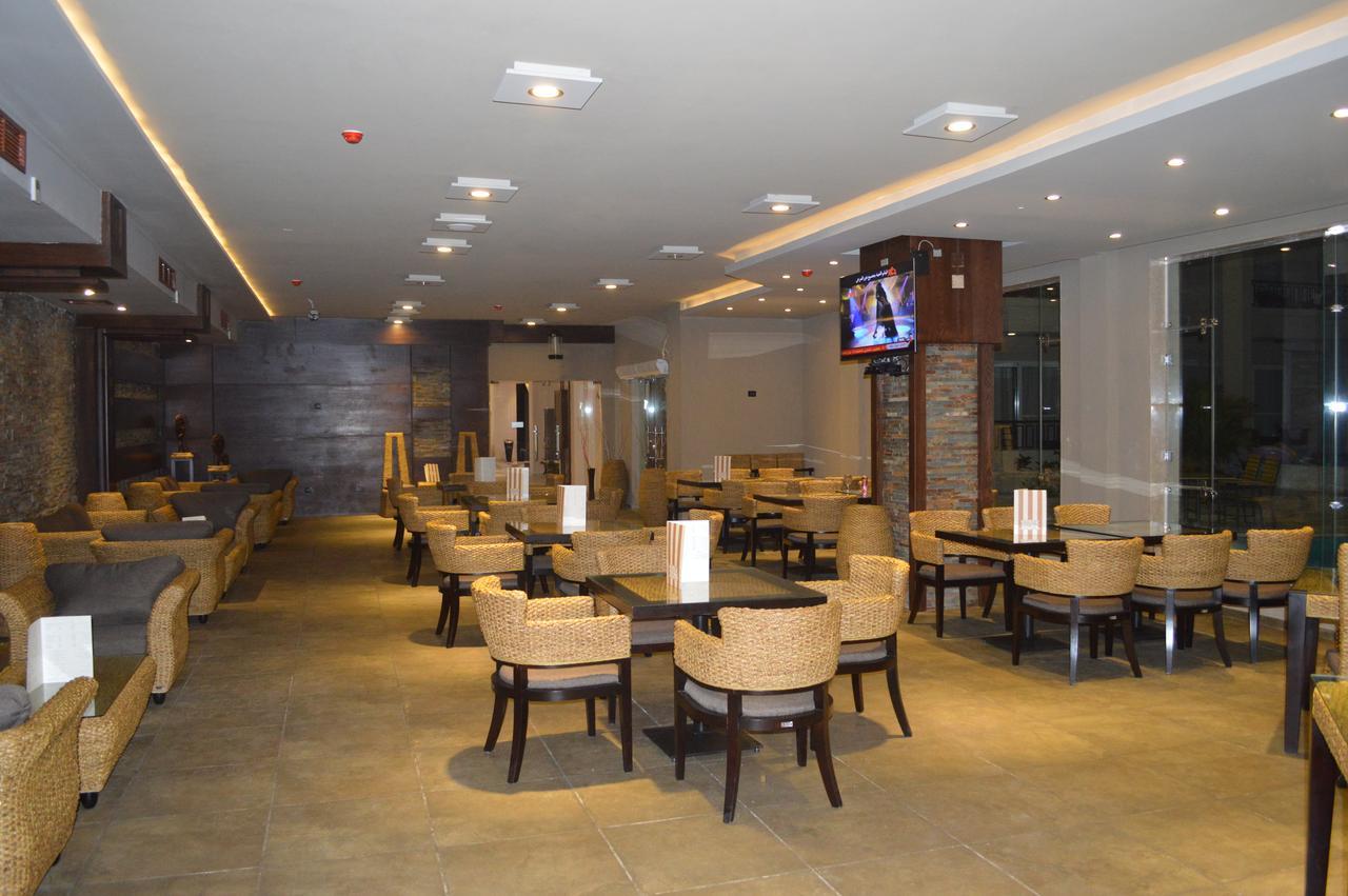 Panacea Suites Hotel Borg El Arab Extérieur photo