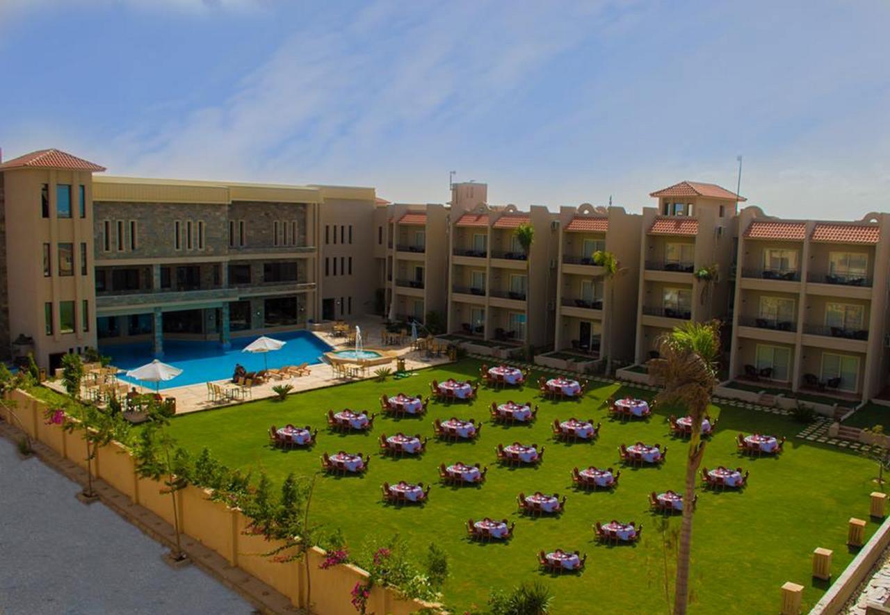 Panacea Suites Hotel Borg El Arab Extérieur photo