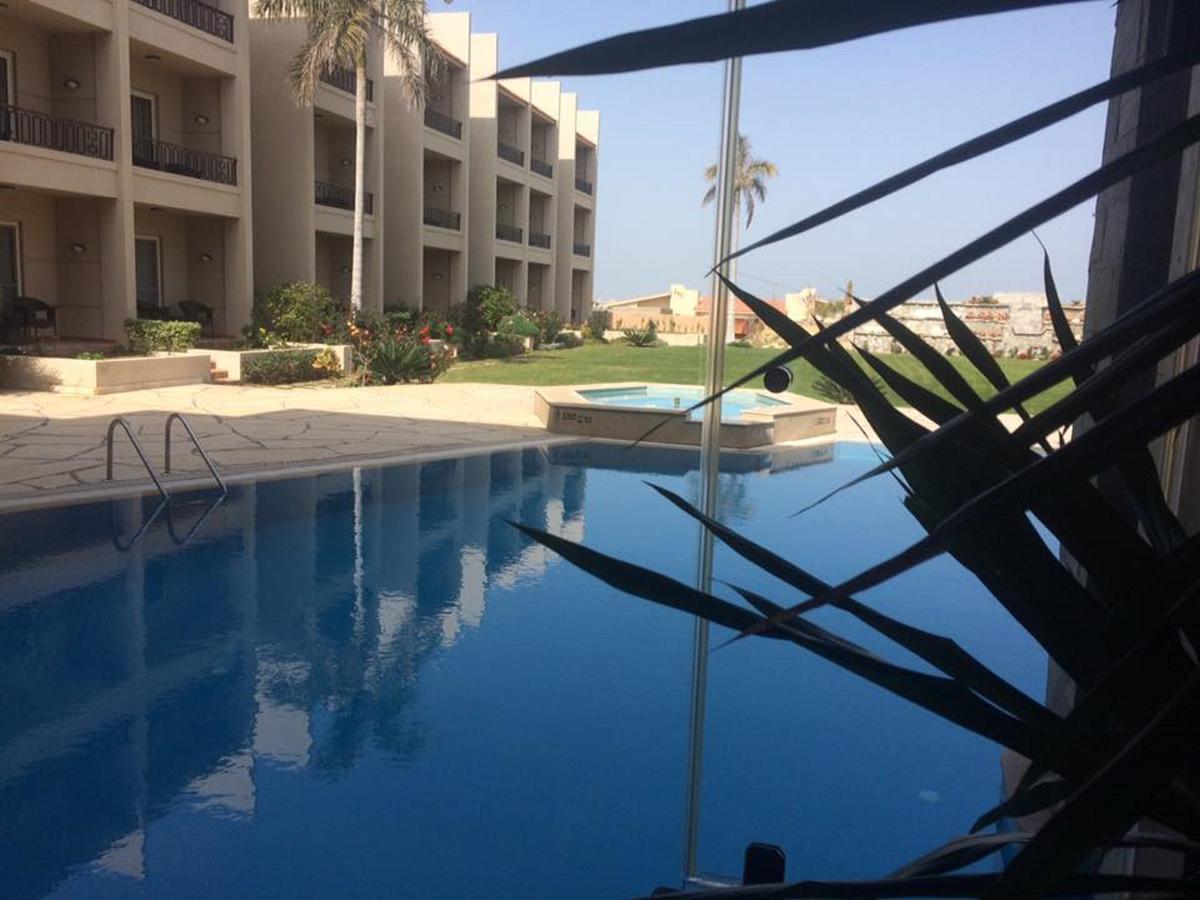 Panacea Suites Hotel Borg El Arab Extérieur photo