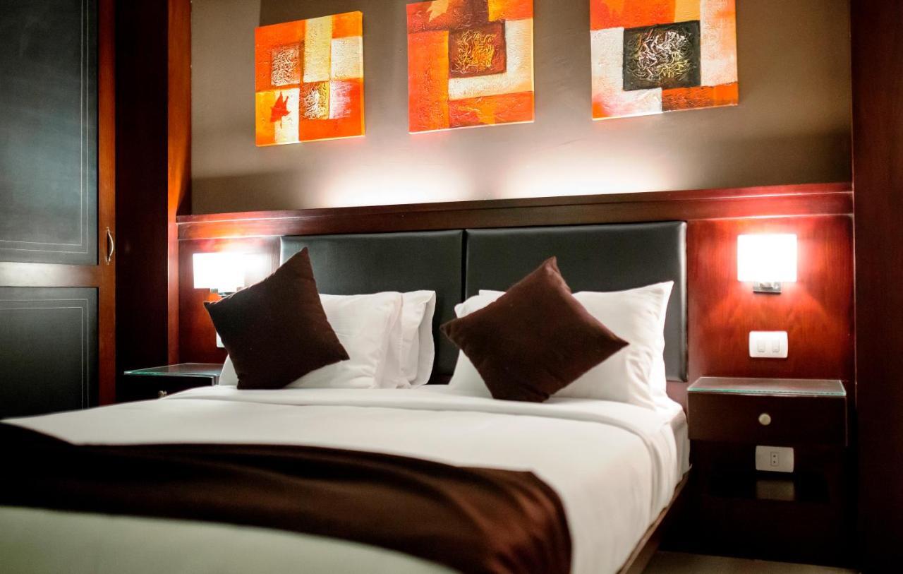 Panacea Suites Hotel Borg El Arab Extérieur photo
